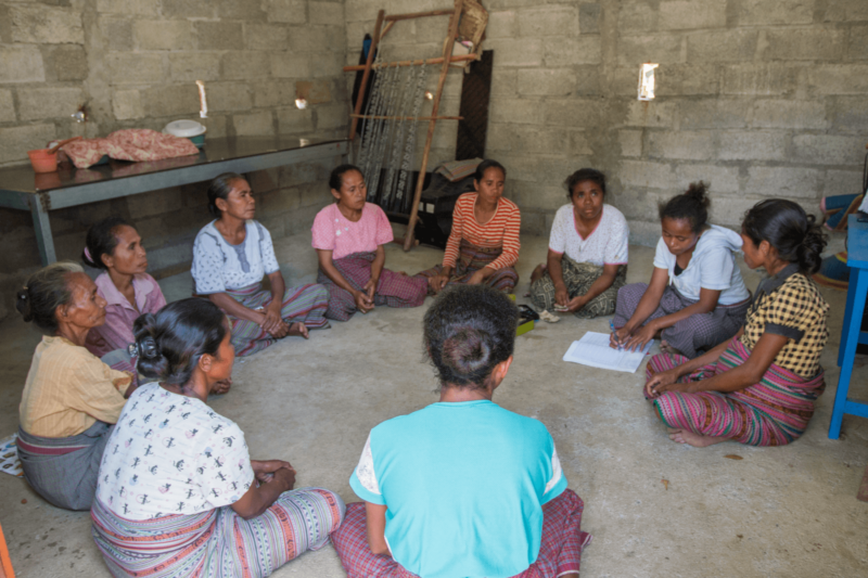 Oecusse, Timor-Leste: The Nipane community savings for change group pictured during a group meeting to discuss personal finance and savings goals. Oxfam acknowledges the support of the Australian Government through the Australian NGO Cooperation Program (ANCP). Photo: Ismenio Pereira/Oxfam